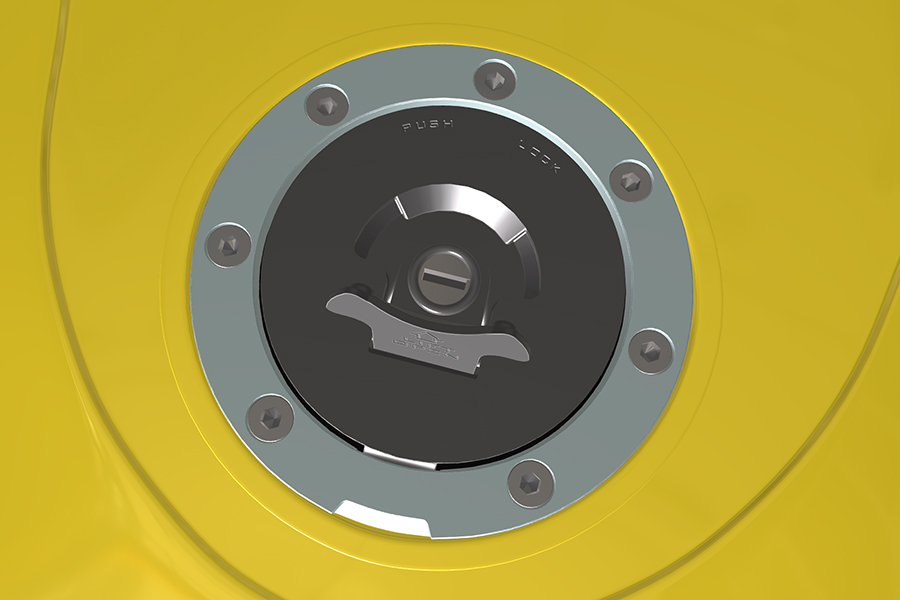 Motorcycle fuel tank cap with color and material variation