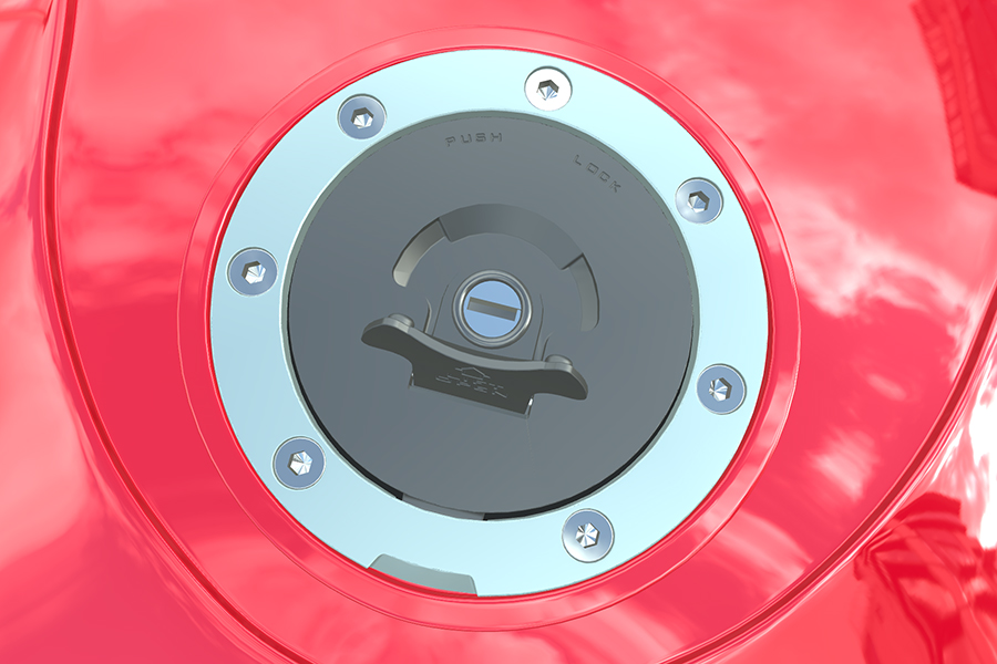 Motorcycle fuel tank cap with variation in reflections (outdoor)