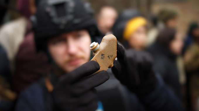 Person holding a mine Person holding a mine